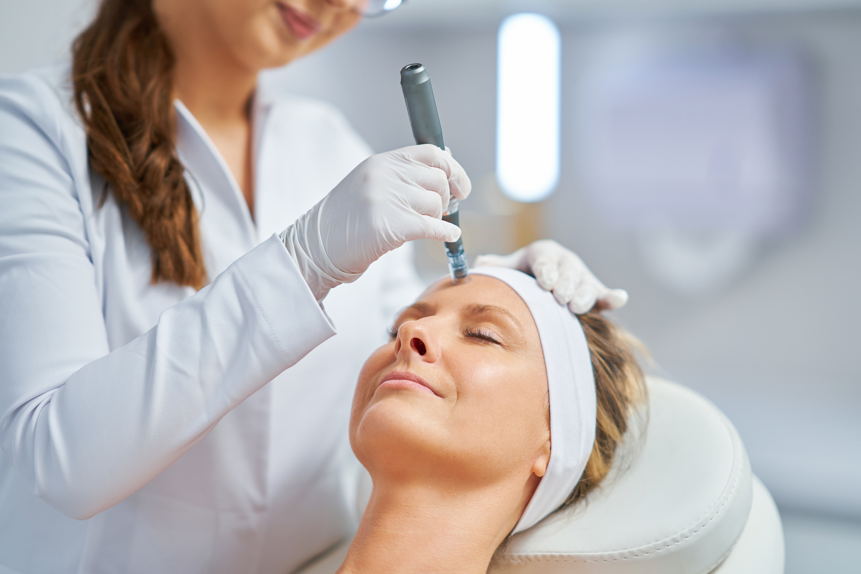 Woman in a Beauty Salon Having Needle Mesotherapy Treatment
